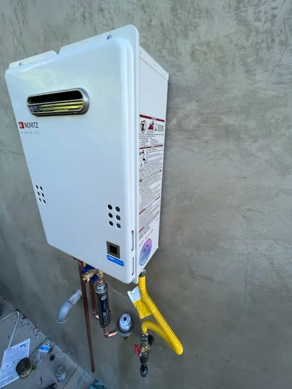 Tankless water heater installation for East Freedom homes